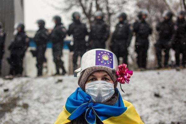 Participant of protest rallies for Ukraine's European integration in Grushevskogo Street in Kiev, Ukraine - Sputnik International