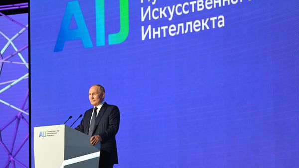 Russian President Vladimir Putin speaks during a plenary session of the AI Journey 2023 - Sputnik International