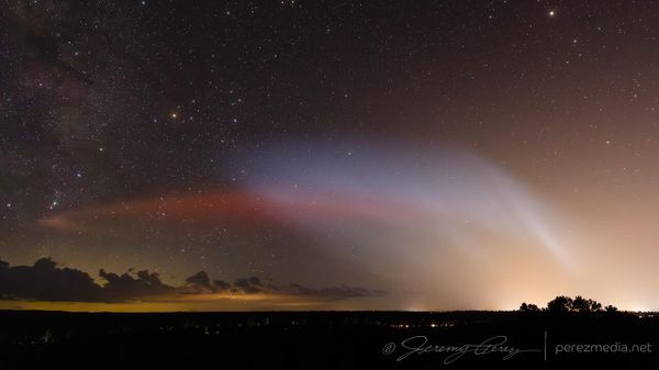A red aurora produced by a SpaceX Falcon 9 rocket launch from Vandenberg Air Force Base in California, which tore a temporary hole in the ionosphere, on August 8, 2023. - Sputnik International