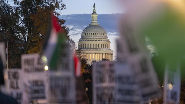The U.S. Capitol's seen as protesters rally at a pro-Palestinian demonstration asking for a cease fire in Gaza, in Washington, Friday, Nov. 17, 2023.  - Sputnik International