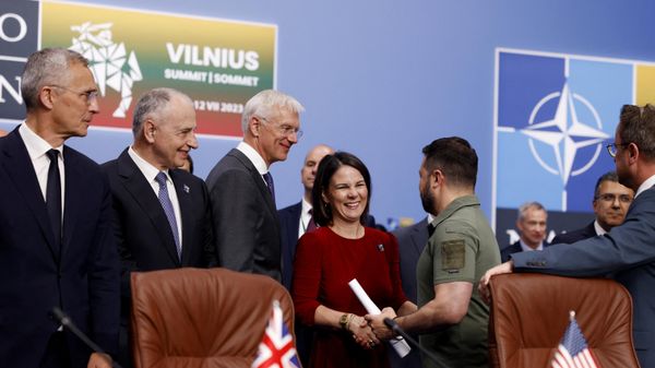 Ukraine's President Volodymyr Zelensky greeted by NATO Secretary General Jens Stoltenberg and German Foreign Minister Annalena Baerbock as he arrives to attend a meeting of the NATO-Ukraine Council during the NATO Summit in Vilnius on July 12, 2023. Ukraine's President Volodymyr Zelensky greeted by NATO Secretary General Jens Stoltenberg and German Foreign Minister Annalena Baerbock as he arrives to attend a meeting of the NATO-Ukraine Council during the NATO Summit in Vilnius on July 12, 2023. - Sputnik International