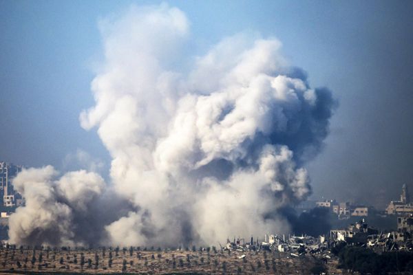 This picture taken from southern Israel near the border with the Gaza Strip shows smoke rising from buildings after being hit by Israeli strikes in battles between Israel and Hamas militants, on December 1, 2023. - Sputnik International