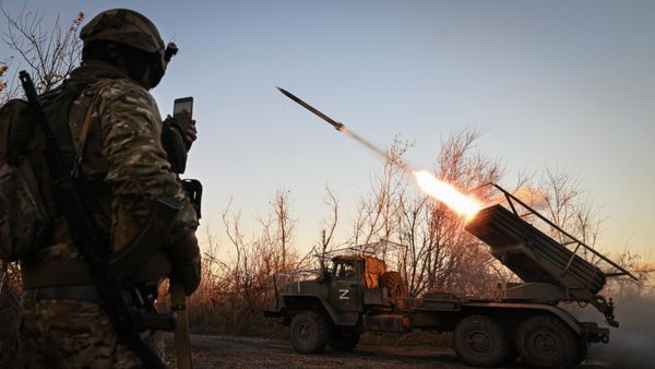 Russian servicemen fire a BM-21 Grad multiple rocket launcher towards Ukrainian positions in the course of Russia's military operation in Ukraine, at the unknown location in the Donetsk People's Republic, Russia. - Sputnik International