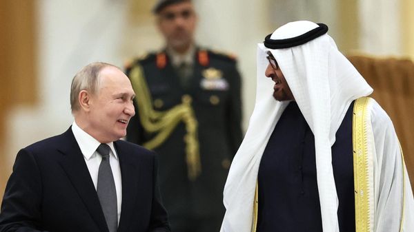 Russian President Vladimir Putin and President of the United Arab Emirates Sheikh Mohamed bin Zayed Al Nahyan arrive for a welcoming ceremony before a meeting at Qasr Al Watan Palace in Abu Dhabi, United Arab Emirates. - Sputnik International