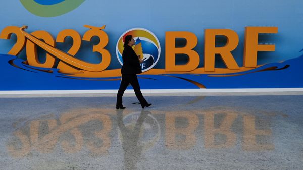  A woman walks in the venue of the Belt and Road Forum in Beijing on October 17, 2023.  - Sputnik International