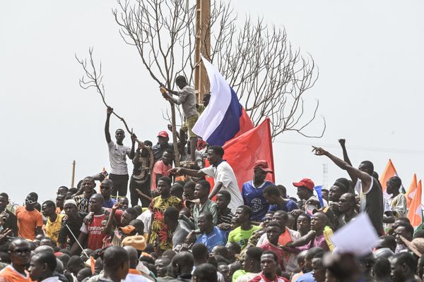 A wave of coup d’etats swept across Africa. The continent experienced newfound uplift against the dreaded post-colonial status-quo. (Russian national flags are seen as supporters of Niger's National Council of Safeguard of the Homeland protest outside the Niger and French airbase in Niamey on September 2 to demand the permanent departure of the French army from the country). - Sputnik International