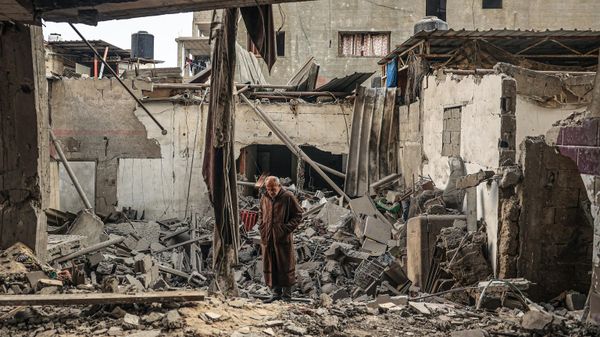 A Palestinian man walks amidst debris following Israeli bombardment in Rafah, in the southern Gaza Strip on December 14, 2023. A Palestinian man walks amidst debris following Israeli bombardment in Rafah, in the southern Gaza Strip on December 14, 2023. - Sputnik International