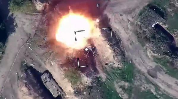In this handout video grab taken from footage released by the Russian Defence Ministry, a view shows air strikes carried out by Russia's self-destructing suicide drone Lancet hitting, according to the ministry, vehicles of Ukrainian troops in the course of Russia's military operation in Ukraine, at the unknown location.  - Sputnik International