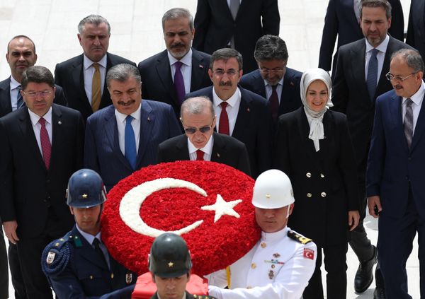 In a high stakes Turkish presidential election, President Recep Tayyip Erdogan won a historic runoff election and took office for a third time in a row. (Turkish President Recep Tayyip Erdogan (center) and members of his new cabinet walk with servicemen carrying a wreath as they visit Anitkabir, the mausoleum of Turkish Republic's founder Mustafa Kemal Ataturk, before their first cabinet meeting in Ankara, on June 6, 2023). - Sputnik International