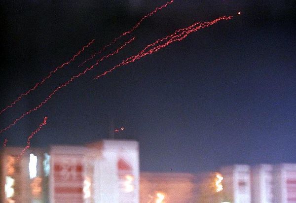 Traces of anti-aircraft fire light the sky in Baghdad, early morning December 17. US and British missiles pounded the Iraqi capital as punishment for Iraq's failure to cooperate with UN weapons inspectors. US President Bill Clinton called the air strikes "strong and sustained." - Sputnik International