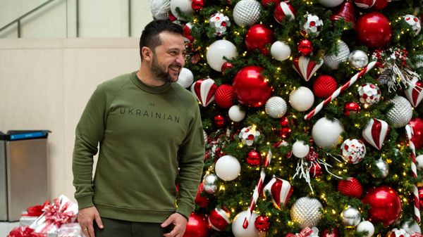 Ukrainian President Volodymyr Zelensky smiles back at International Monetary Fund Director Kristalina Georgieva after they spoke to the press following talks at IMF headquarters in Washington, DC, on December 11, 2023. - Sputnik International