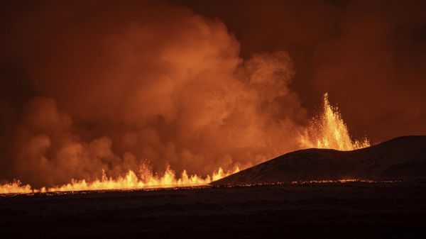 Lava fountains are seen as volcanic eruption started, turning the sky orange, in Grindavik on Iceland's Reykjanes Peninsula, Monday, Dec. 18, 2023.  - Sputnik International