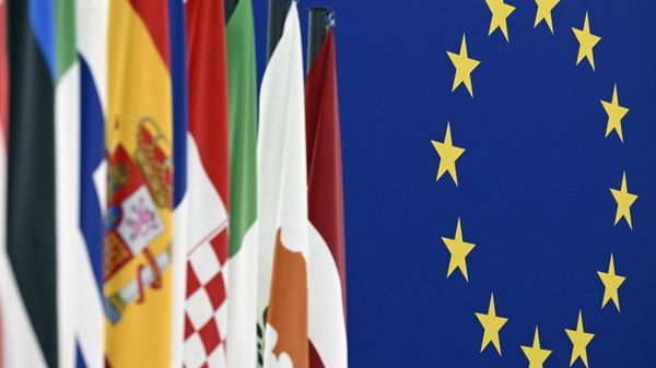 The EU flag (R) and flags of other nations are pictured at the European Parliament in Strasbourg, eastern France, on December 14, 2022.  - Sputnik International