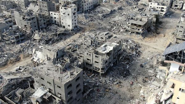 An aerial view on December 26, 2023 shows destroyed buildings in Beit Lahia following Israeli bombardments in the northern Gaza Strip, amid ongoing battles between Israel and the Palestinian militant group Hamas - Sputnik International
