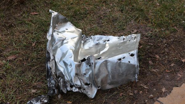 A view shows a fragment of a shell lying on the ground after a shelling by the Ukrainian military, in Belgorod, Russia. - Sputnik International