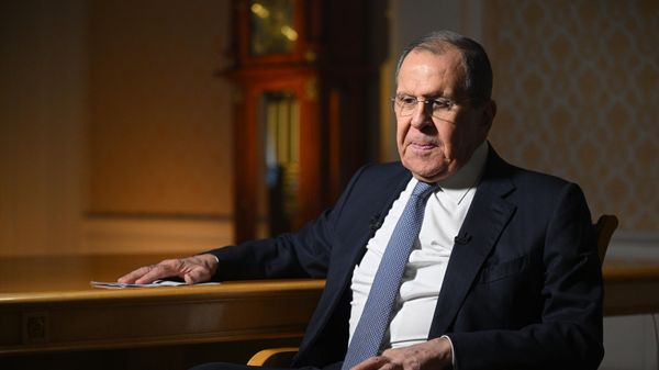 Russian Foreign Minister Sergey Lavrov attends an interview with Dmitry Kiselev, director general of the Rossiya Segodnya International Media Group, in Moscow, Russia - Sputnik International