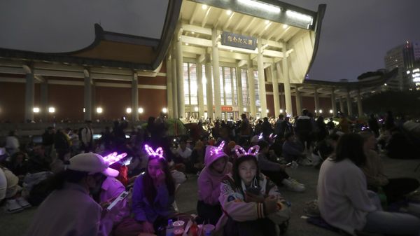 People wear New Year's costumes and wait the turn of the year in Taipei, Taiwan, Sunday, Dec. 31, 2023. - Sputnik International