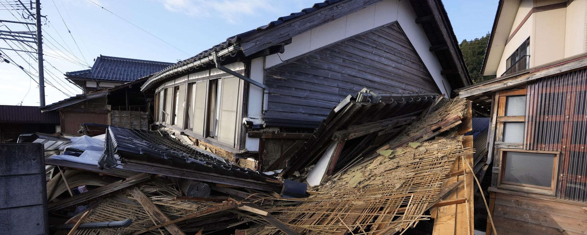 A two-story house with its first floor collapsed caused by powerful earthquake is seen Tuesday, Jan. 2, 2024, near Nanao, Ishikawa Prefecture, Japan. A two-story house with its first floor collapsed caused by powerful earthquake is seen Tuesday, Jan. 2, 2024, near Nanao, Ishikawa Prefecture, Japan. - Sputnik International, 1920, 08.01.2024