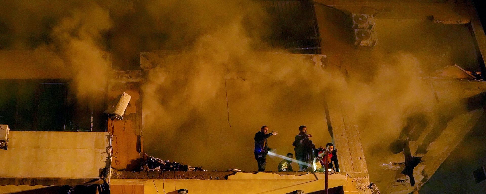 Smoke rises from a destroyed apartment as civil defense workers search for survivors following a massive explosion in the southern Beirut suburb of Dahiyeh, Lebanon, Tuesday, Jan. 2, 2024. An explosion killed Saleh Arouri, a top official with the Palestinian militant group Hamas and three others, officials with Hamas and the Lebanese group Hezbollah said. - Sputnik International, 1920, 04.01.2024