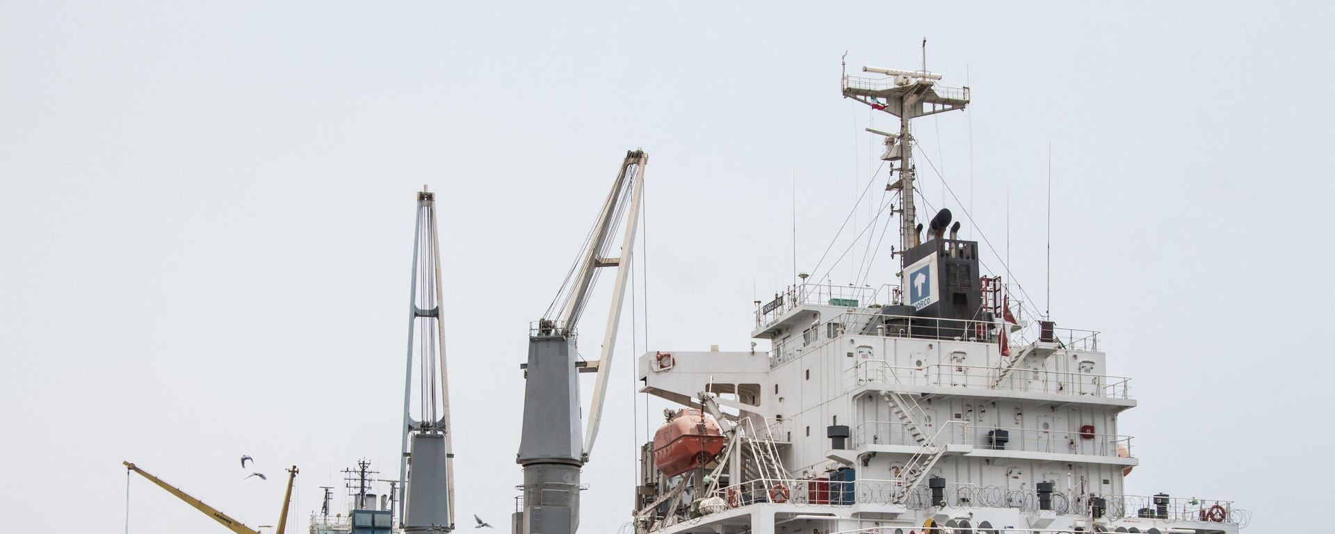 Trucks loaded with NGOs' food ratios from the Thorco Liva ship leave the Berbera port of Somaliland on July 21, 2018. Trucks loaded with NGOs' food ratios from the Thorco Liva ship leave the Berbera port of Somaliland on July 21, 2018. - Sputnik International, 1920, 03.01.2024