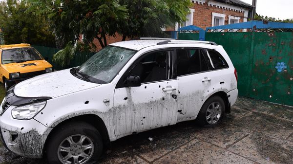 A view shows a car damaged by shelling, as Russia's military operation in Ukraine continues, in the village of Logachevka, near the border with Ukraine, Belgorod region, Russia. At least one person was killed and another four injured by Ukrainian shelling of the Russian border crossing at Logachevka, the governor of Belgorod region Vyacheslav Gladkov said on September 12. - Sputnik International