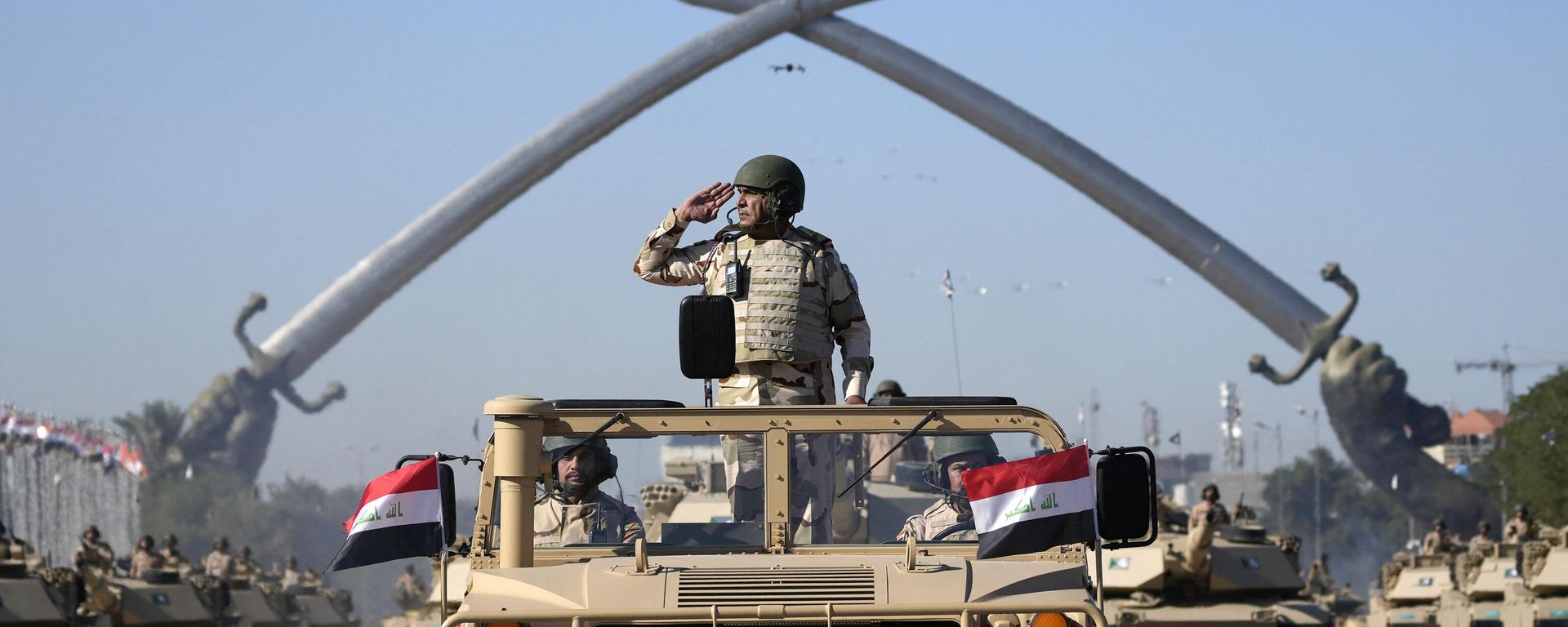 Iraqi army troops drive their vehicles under the victory Arch landmark during a parade marking the Army Day in Baghdad, Iraq, on January 6, 2024. Iraqi army troops drive their vehicles under the victory Arch landmark during a parade marking the Army Day in Baghdad, Iraq, on January 6, 2024. - Sputnik International, 1920, 09.01.2024