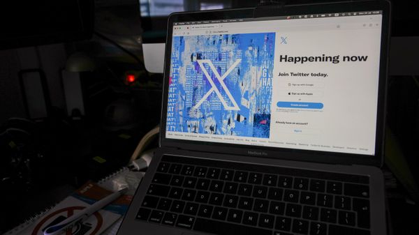 FILE - A view of a laptop shows the Twitter sign-in page with their the new logo, in Belgrade, Serbia, Monday, July 24, 2023. IBM has stopped advertising on social media platform X, Thursday, Nov. 16, after a report that its ads were appearing alongside material praising Adolf Hitler and the Nazis, in a fresh setback for the company's plans to win back big brands and their ad dollars.  - Sputnik International