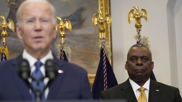 Defense Secretary Lloyd Austin listens President Joe Biden speaks about Ukraine from the Roosevelt Room at the White House in Washington, Wednesday, Jan. 25, 2023. - Sputnik International