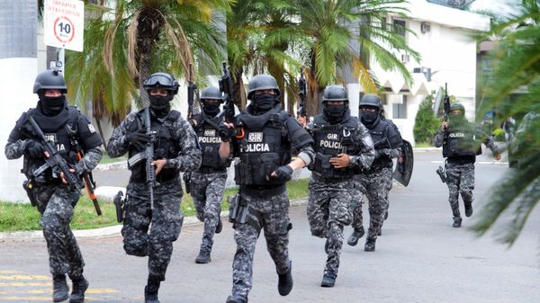 An Ecuadorean police squad enters the premises of Ecuador's TC television channel after unidentified gunmen burst into the state-owned television studio live on air on January 9, 2024, in Guayaquil, Ecuador, a day after Ecuadorean President Daniel Noboa declared a state of emergency following the escape from prison of a dangerous narco boss - Sputnik International