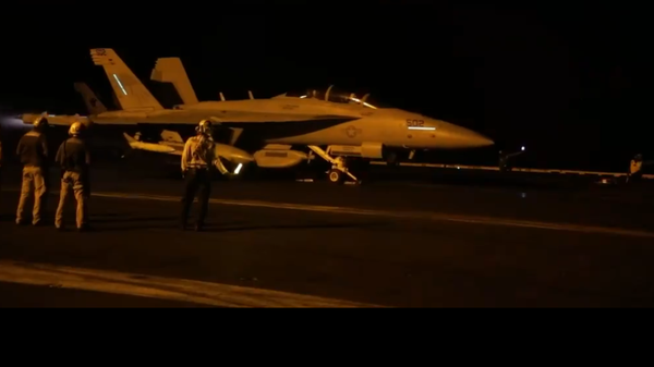An X screenshot of a US Navy plane taking part in in the January 11 air strikes on Houthi targets in Yemen, conducted by the US and the UK.  - Sputnik International