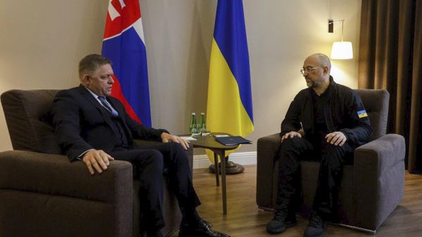 Ukranian Prime Minister Denys Shmyhal, right, talks with Slovakia's Prime Minister Robert Fico during their meeting in Uzhgorod, Ukraine, Wednesday, Jan. 24, 2024.  - Sputnik International