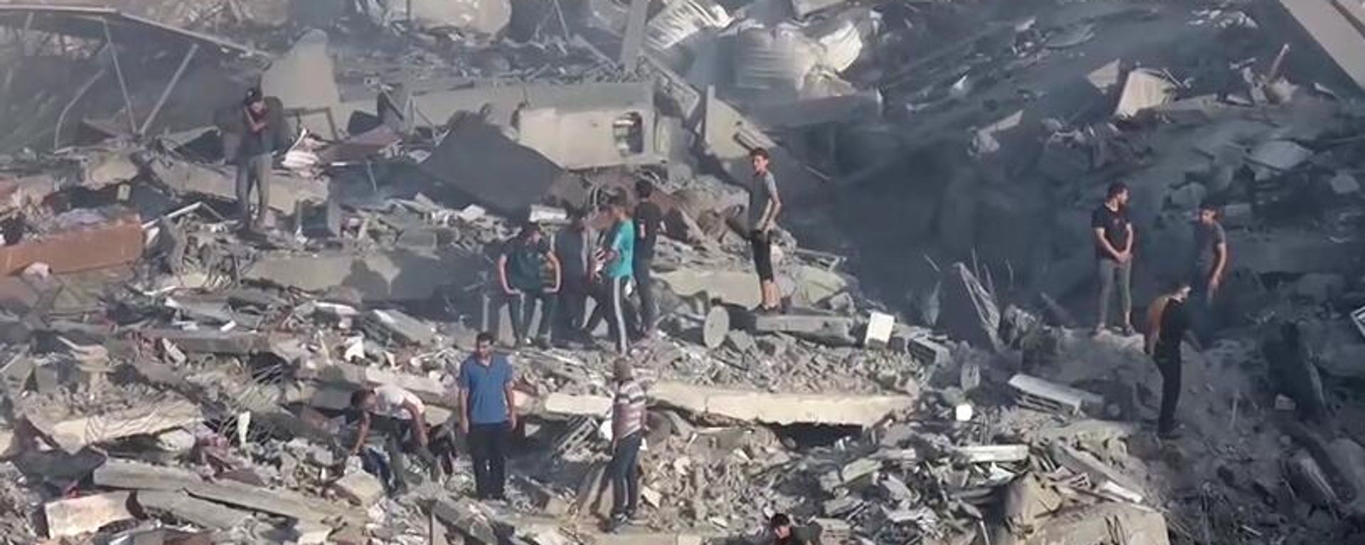 In this video grab, residential buildings destroyed by a rocket attack from Israel, as the conflict between Israel and Palestinian Islamist group Hamas continues, in Gaza, Palestine - Sputnik International, 1920, 26.01.2024
