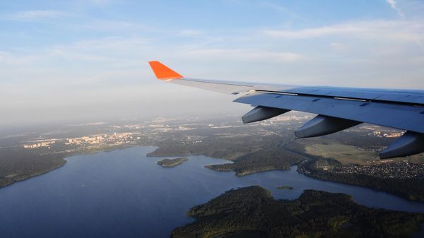 An aircraft is flying over the Moscow Canal - Sputnik International