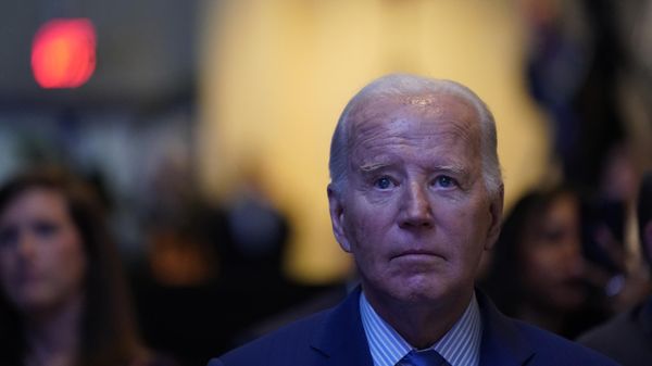 US President Joe Biden listens to speakers during the South Carolina’s First in the Nation Dinner at the South Carolina State Fairgrounds in Columbia, South Carolina, on January 27, 2024 - Sputnik International