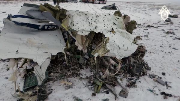 Debris are seen at the crash site of an Ilyushin Il-76 military transport airplane of the Russian air forces near the village of Yablonovo in Belgorod region - Sputnik International