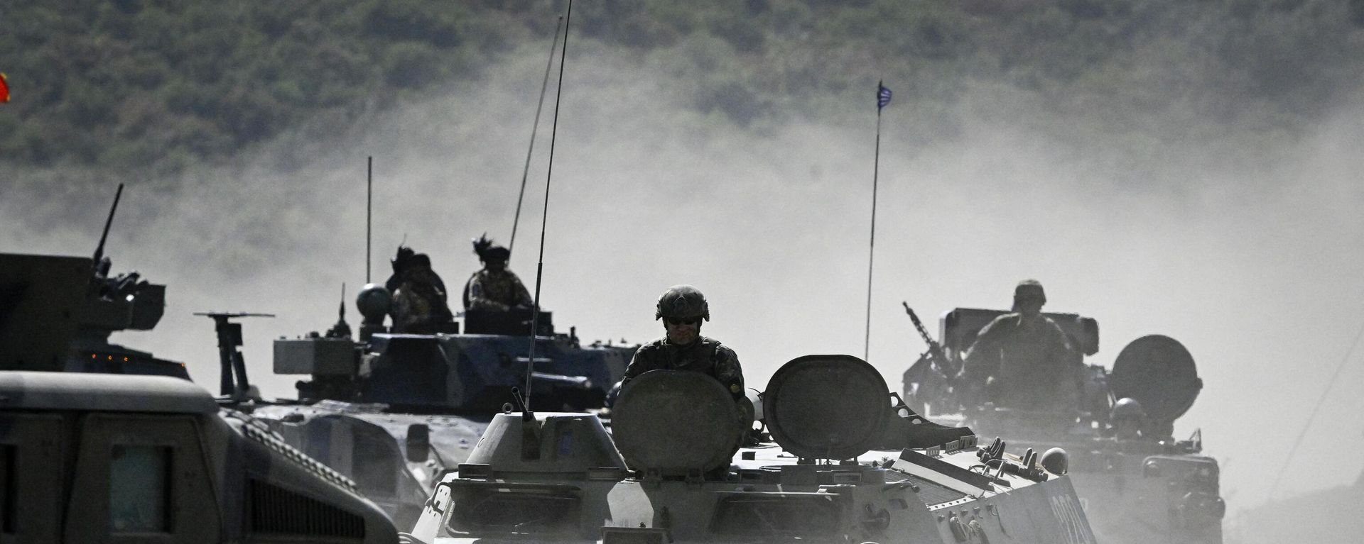 Servicemen drive armoured vehicles as they take part in the NATO Noble Blueprint 23 joint military exercise at the Novo Selo military ground, northwestern Bulgaria, on September 26, 2023. Servicemen drive armoured vehicles as they take part in the NATO Noble Blueprint 23 joint military exercise at the Novo Selo military ground, northwestern Bulgaria, on September 26, 2023. - Sputnik International, 1920, 04.02.2024