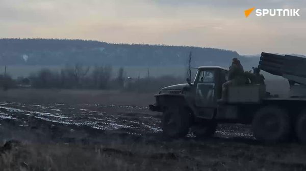 Russia's Southern Group's MLRS Grad crews took out a Ukrainian tank near Donetsk - Sputnik International