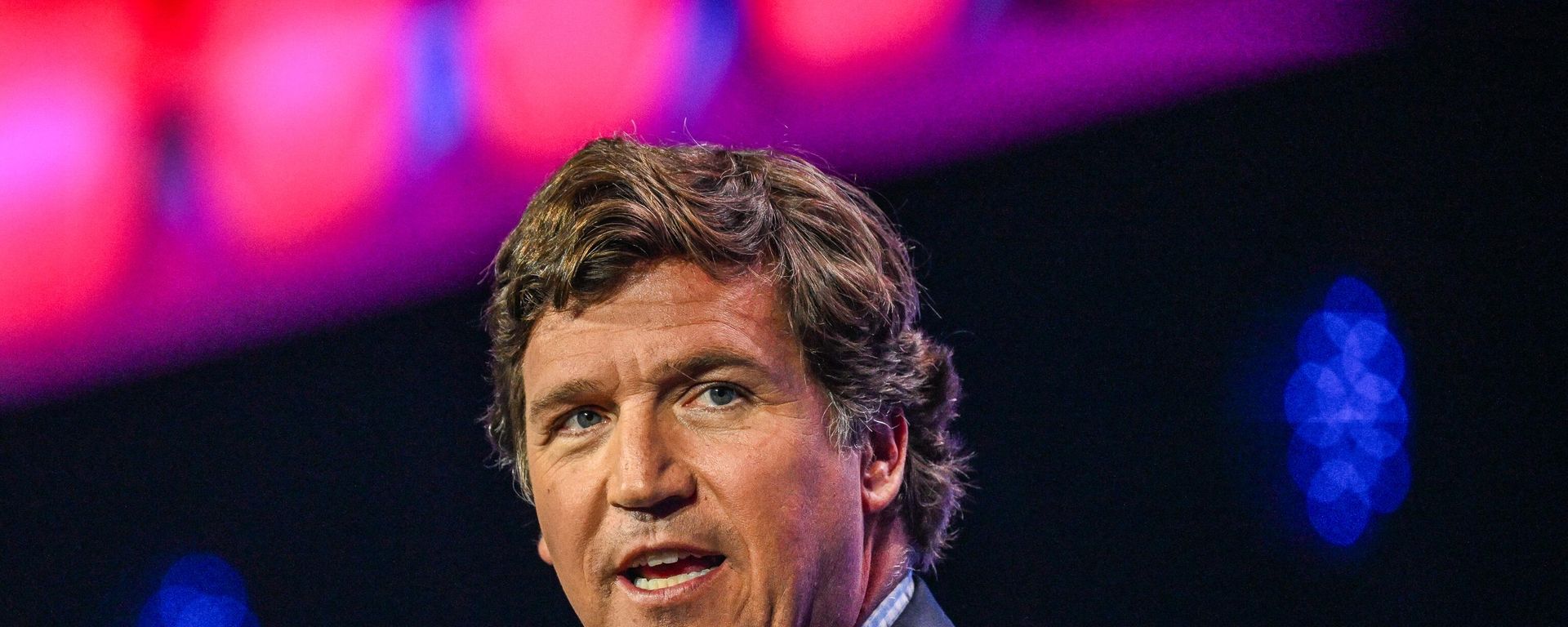 US conservative political commentator Tucker Carlson speaks at the Turning Point Action USA conference in West Palm Beach, Florida, on July 15, 2023. US conservative political commentator Tucker Carlson speaks at the Turning Point Action USA conference in West Palm Beach, Florida, on July 15, 2023. - Sputnik International, 1920, 05.02.2024