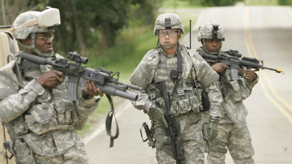 Maj. Aaron Reisinger leads Team Mojo during training at Fort Riley, Kan., Thursday, June 28, 2007 - Sputnik International
