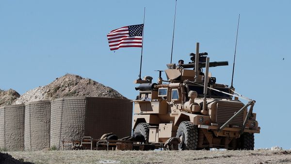 In this April 4, 2018, file photo, a U.S. soldier sits on an armored vehicle on a newly installed position, near front line between the U.S-backed Syrian Manbij Military Council and the Turkish-backed fighters, in Manbij, north Syria - Sputnik International