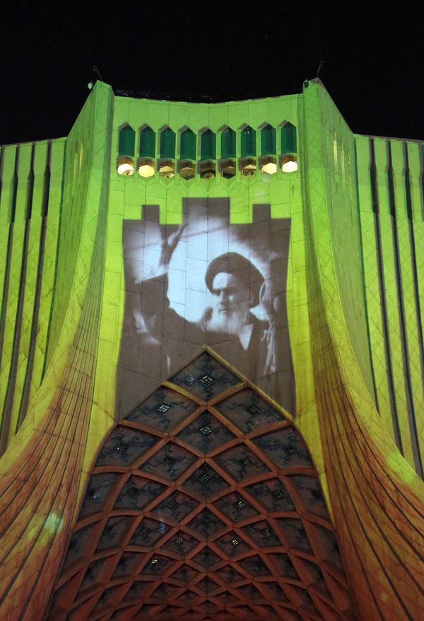 Pictured: Ayatollah Khomeini waving to supporters in a historic photo projected onto the Azadi (Freedom)Tower in Tehran.After the start of the CIA dirty war in Syria in 2011, Russia and Iran joined forces to assist the country in its battle against terrorism, with Moscow deploying a limited contingent of military aircraft and warships in 2015 to conduct coordinated strikes against terrorist targets, reportedly after encouragement by late Islamic Revolutionary Guard Corps Quds Force Commander Qasem Soleimani.In 2019, Russian, Iranian, and Chinese warships held their first-ever joint drills in the Gulf of Oman, signaling strengthening strategic ties between the three nations.Throughout this period, economic cooperation continued to expand as well, with trade turnover hitting $4.9 billion in 2022 and expected to grow further after the completion of ambitious strategic infrastructure projects like the North-South Transport Corridor initiative. - Sputnik International