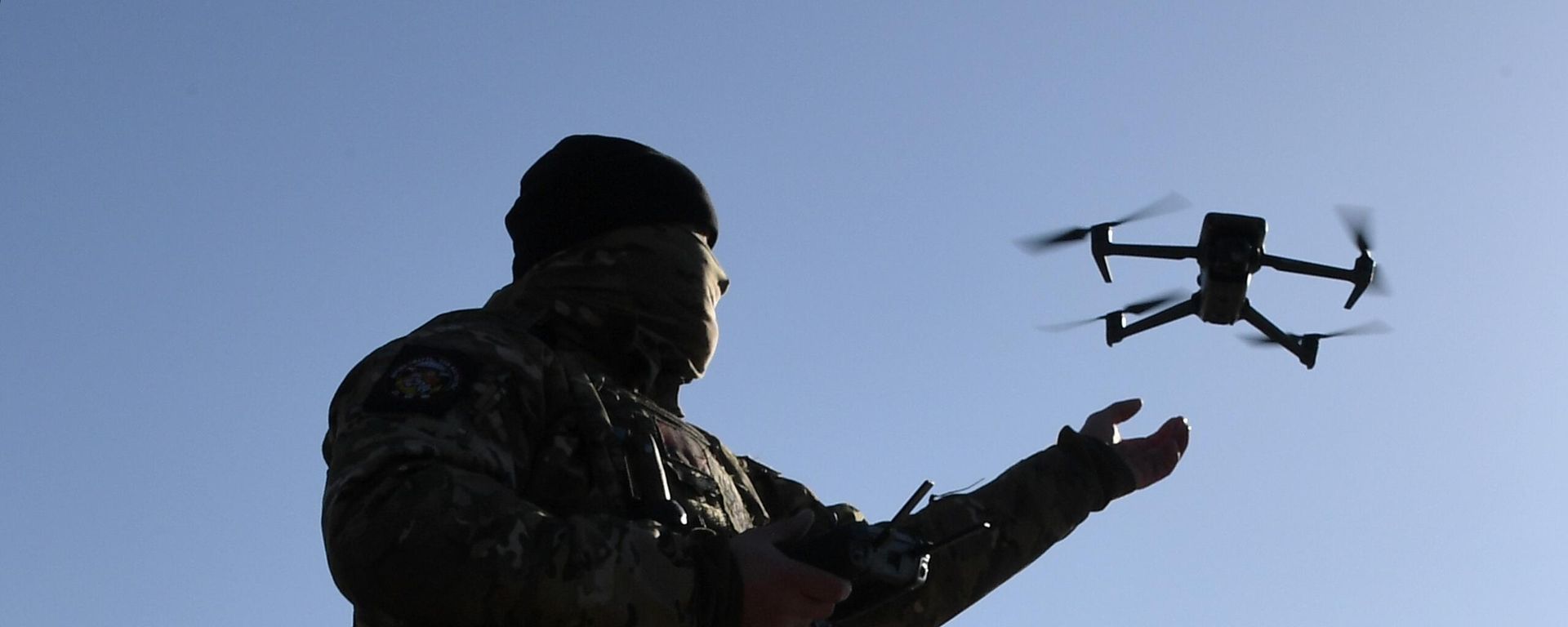 A Russian serviceman demonstrating drone capabilities during drills. File photo A Russian serviceman demonstrating drone capabilities during drills. File photo - Sputnik International, 1920, 12.02.2024