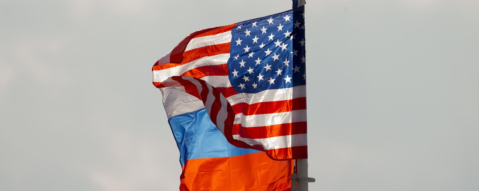 U.S. and Russian national flags wave on the wind before US Secretary of State Rex Tillerson arrival in Moscow's Vnukovo airport, Russia, Tuesday, April 11, 2017 U.S. and Russian national flags wave on the wind before US Secretary of State Rex Tillerson arrival in Moscow's Vnukovo airport, Russia, Tuesday, April 11, 2017 - Sputnik International, 1920, 11.12.2025