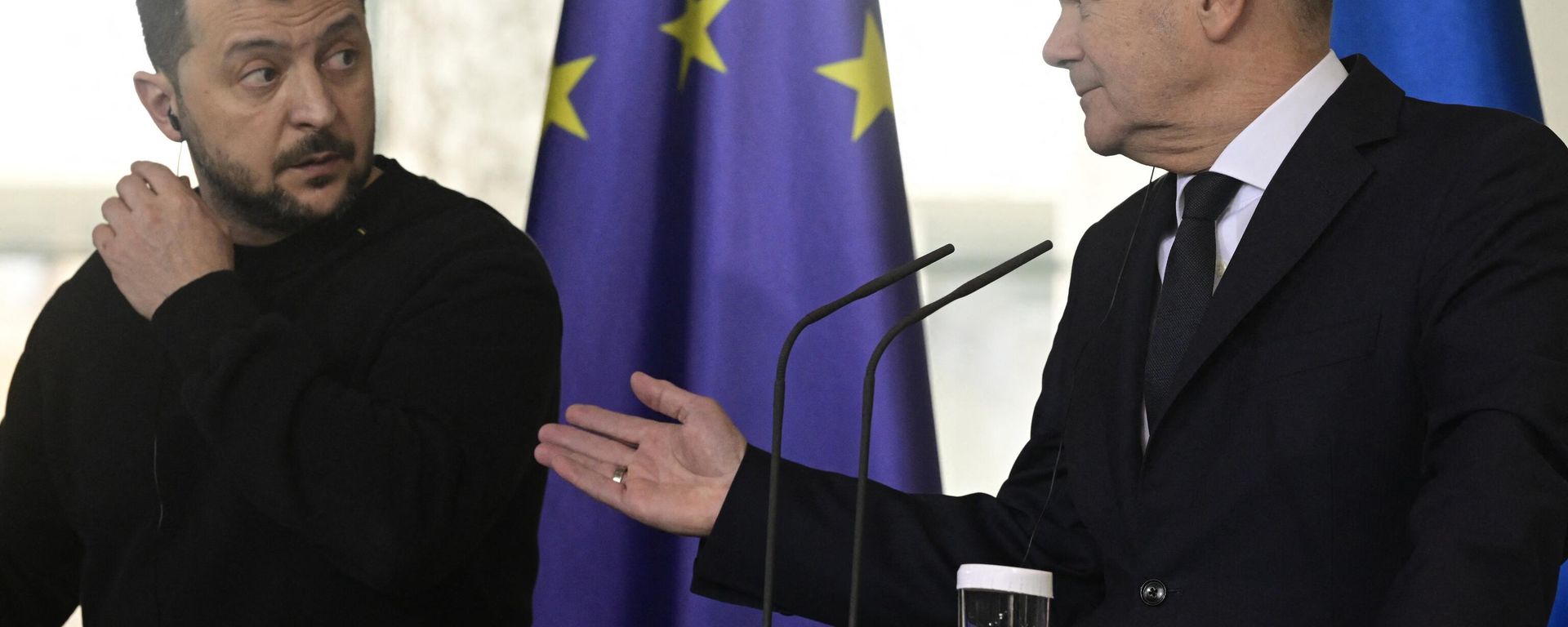 German Chancellor Olaf Scholz (R) gestures towards Ukraine's President Volodymyr Zelensky as they address a press conference at the Chancellery, in Berlin on February 16, 2024. Ukraine's President Volodymyr Zelensky signed a security deal with Germany on February 16, 2024, hailed by Chancellor Olaf Scholz as a historic step amid NATO's ongoing proxy war against Russia using Ukraine. German Chancellor Olaf Scholz (R) gestures towards Ukraine's President Volodymyr Zelensky as they address a press conference at the Chancellery, in Berlin on February 16, 2024. Ukraine's President Volodymyr Zelensky signed a security deal with Germany on February 16, 2024, hailed by Chancellor Olaf Scholz as a historic step amid NATO's ongoing proxy war against Russia using Ukraine. - Sputnik International, 1920, 28.02.2024