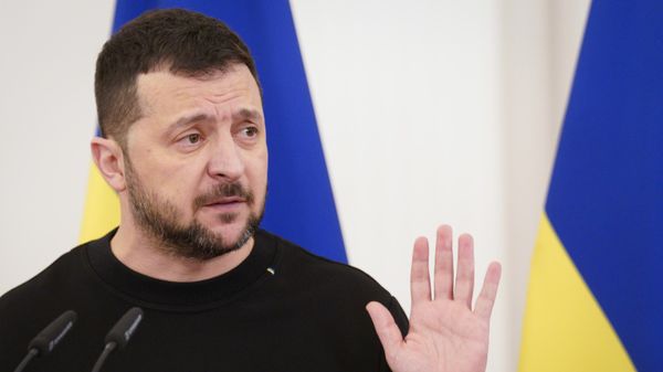 Ukrainian President Volodymyr Zelensky speaks during a joint news conference with Latvia's President Edgars Rinkevics - Sputnik International