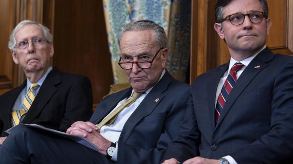 From left, Senate Minority Leader Mitch McConnell, R-Ky., Senate Majority Leader Chuck Schumer, D-N.Y., and Speaker of the House Mike Johnson, R-La., listen to remarks during a Hanukkah gathering at the Capitol in Washington, Tuesday, Dec. 12, 2023. - Sputnik International