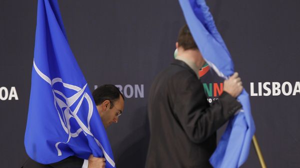 The flags are taken down at the Nato summit in Lisbon, Portugal which ended late Saturday Nov 20 2010 The flags are taken down at the Nato summit in Lisbon, Portugal which ended late Saturday Nov 20 2010 - Sputnik International