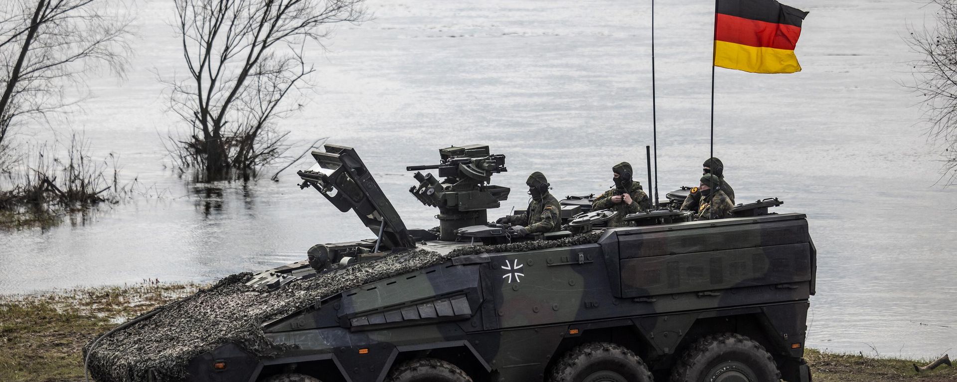 German soldiers in an armoured vehicle as they take part in NATO DRAGON 2024 military exercise in Korzeniewo, Northern Poland, March 4, 2024.  - Sputnik International, 1920, 05.03.2024