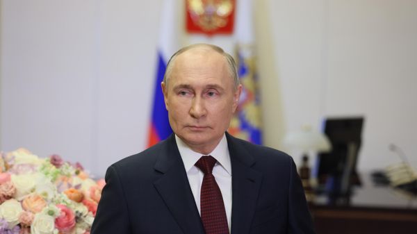 Russian President Vladimir Putin makes a video address to congratulate Russia's women on International Women's Day in Moscow, Russia - Sputnik International