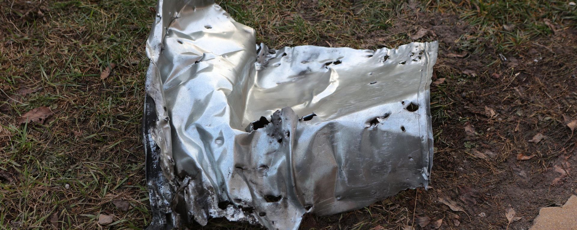 A fragment of a shell lying on the ground after a shelling by the Ukrainian military in Belgorod, Russia - Sputnik International, 1920, 16.03.2024